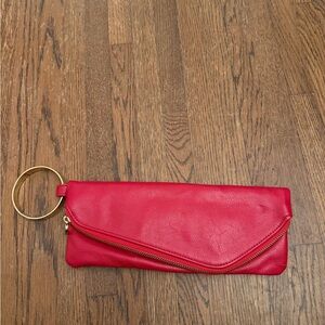 Elegant Red Clutch with Gold Cuff Accent